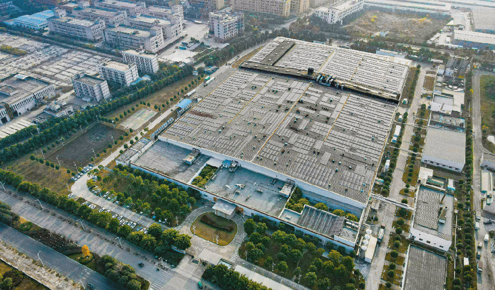 吾盛助力可口可乐首个国内非碳酸饮料工厂屋顶光伏项目成功并网！
